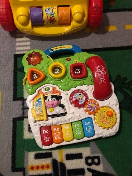 VTech Learning Walker, Baby Walker with Music & Activities 1