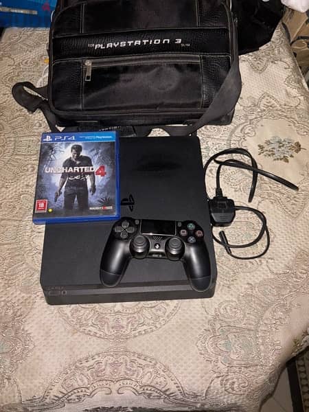 ps4 slim 500 GB + 1 controller + CD uncharted 4 + ps3 bag حاله ممتازة 0