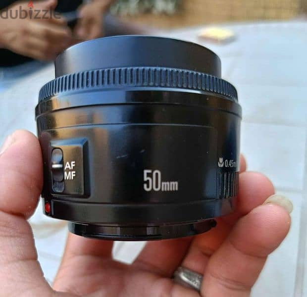 عدسه كانون 50 mm 1