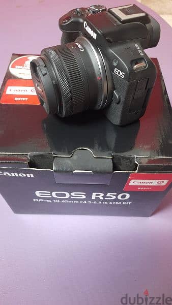 Camera Canon EOS R50 
with RF-S 18-45 mm 0