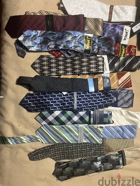 50 name brand dress shirts  and polo shirts sold as package 1