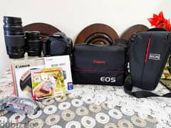 canon 1200D مع عدسه 70 300 جباره في العزل وبرده موجود العدسه الكت لينس 0