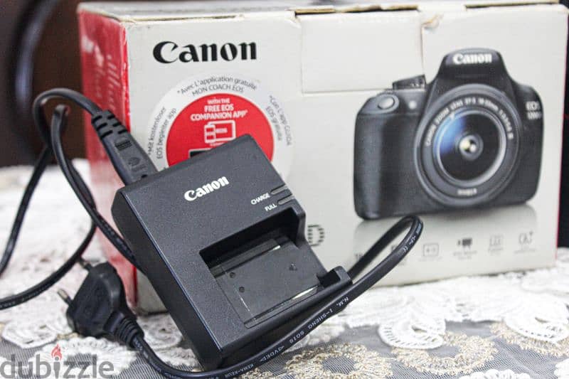 canon 1200D مع عدسه 70 300 جباره في العزل وبرده موجود العدسه الكت لينس 3