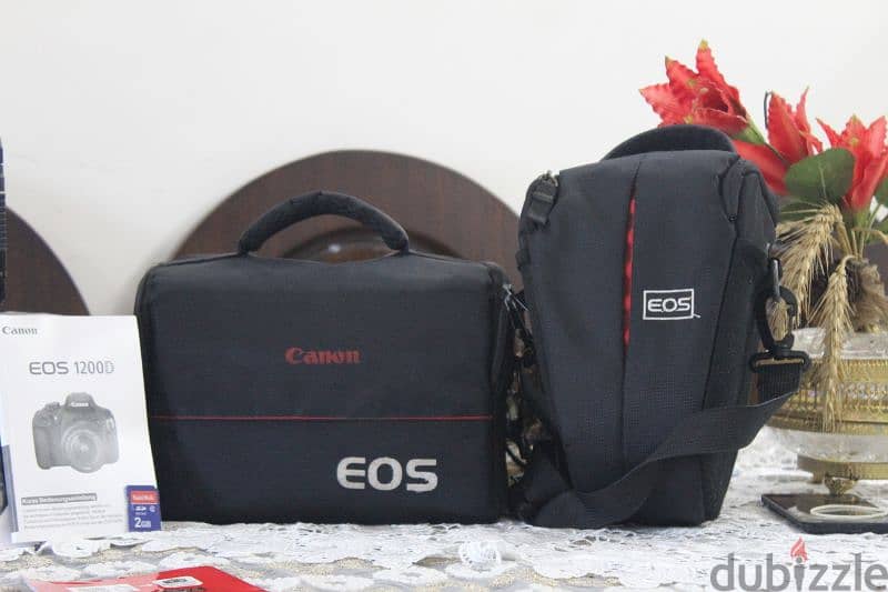 canon 1200D مع عدسه 70 300 جباره في العزل وبرده موجود العدسه الكت لينس 6