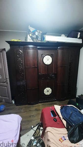 barely used 3 door 10 shelf closet