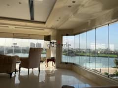 A luxurious hotel studio furnished with upscale furnishings directly on the Nile for sale in installments in the most luxurious hotel tower 0