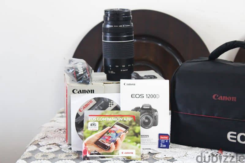 canon 1200D      70/300مع عدسه 2