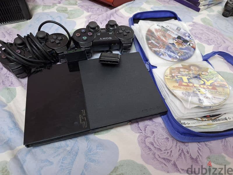 Playstation 2 with 30 games 0