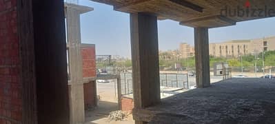 Shop for sale in Settlement, 105m in front of the American University gate, installments up to 6 years, delivery at the end of the year 0