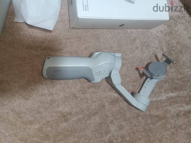 Dji Osmo mobile SE Gimbal
اوزمو موبايل اس اي مثبت تصوير 2