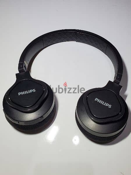 سماعة Philips A4216 رياضية بتشتغل بلوتوث أو سلك، مقاومة للمياه و مايك 0