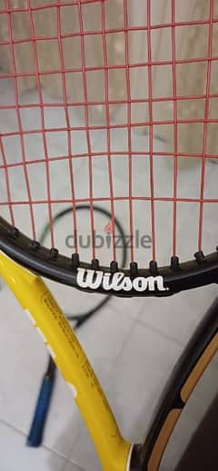 Wilson used tennis racket size 27