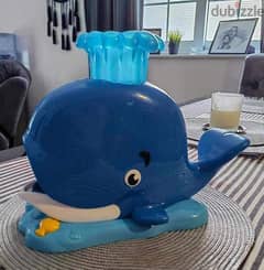 Whale popper toy