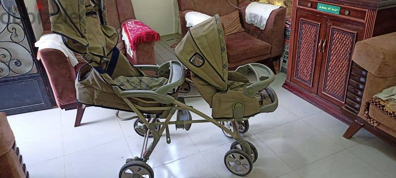 عربية اطفال تؤام والكرسي الأمامي car seat 1