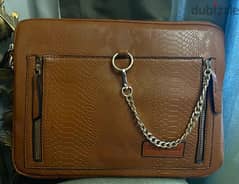 brown cross laptop bag