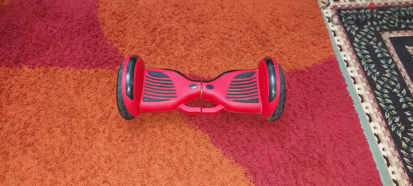 Red Hoverboared with Bluetooth . used like new 10 inch 0