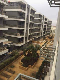 APARTMENTWITH GARDEN  FOR SALE IN TAJ CITY COMPOUND DIRECTLY SUEZ ROAD 0