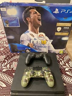 PlayStation 4 Slim 1TB + 2 controllers + FIFA 21 Champions edition 0