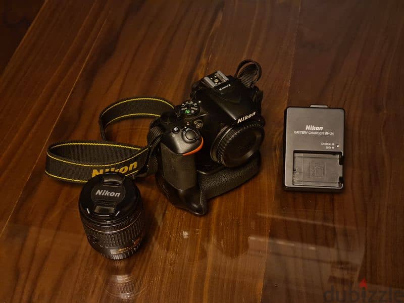 Nikon D5600 + 18-55mm + Battery grip 0