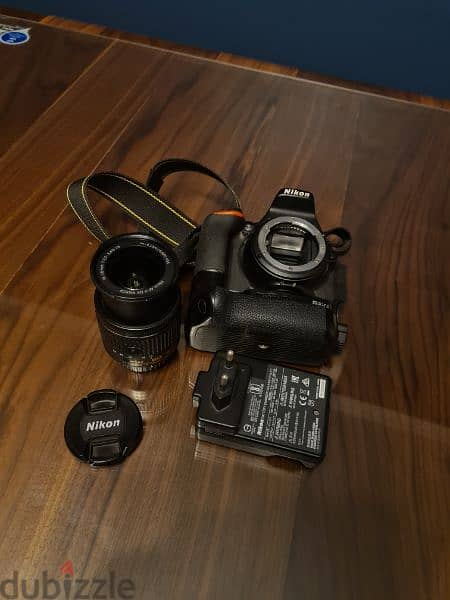 Nikon D5600 + 18-55mm + Battery grip 1