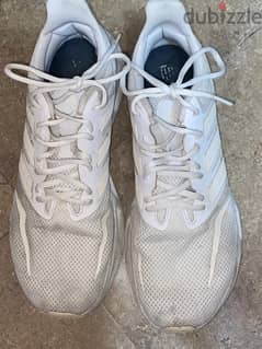 White Adidas running shoes