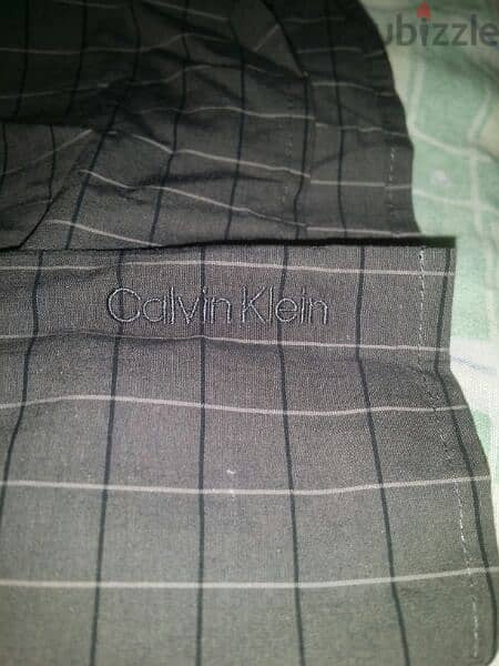 قميص رجالي كالفين  كلاين Calvin  Klein  مقاس L 4