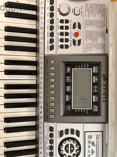 electronic piano board with metal stand