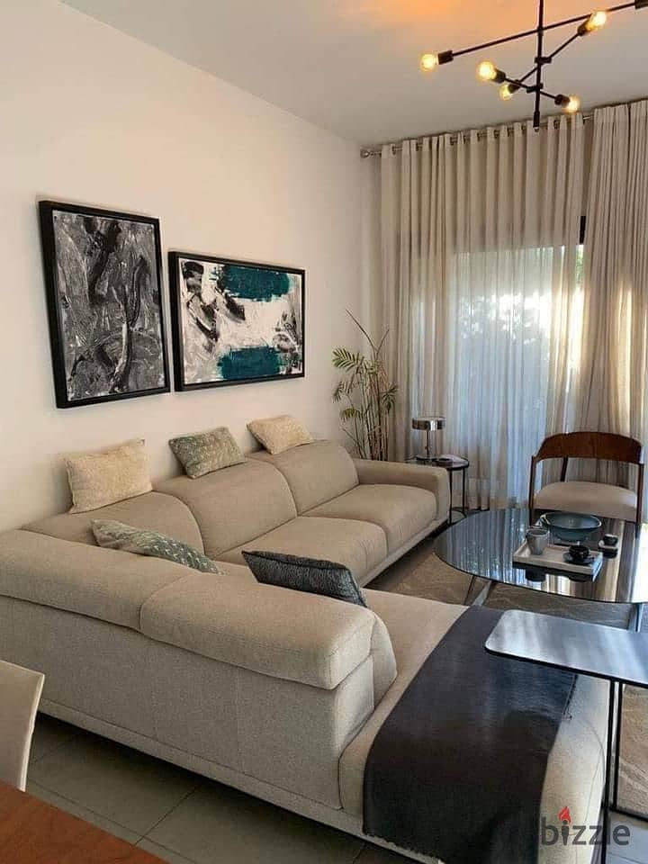 Immediately receive a 3-bedroom apartment, prime location, fully finished, ultra super luxury, in a fully-serviced compound in front of the Internatio 5