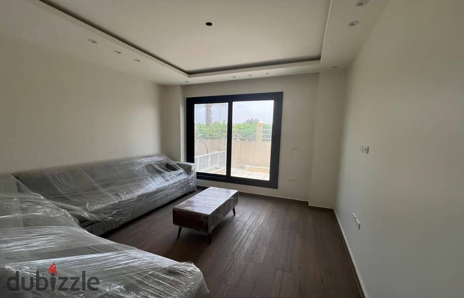 Apartment with furnishings and appliances in Midtown Compound in front of AUC University 3