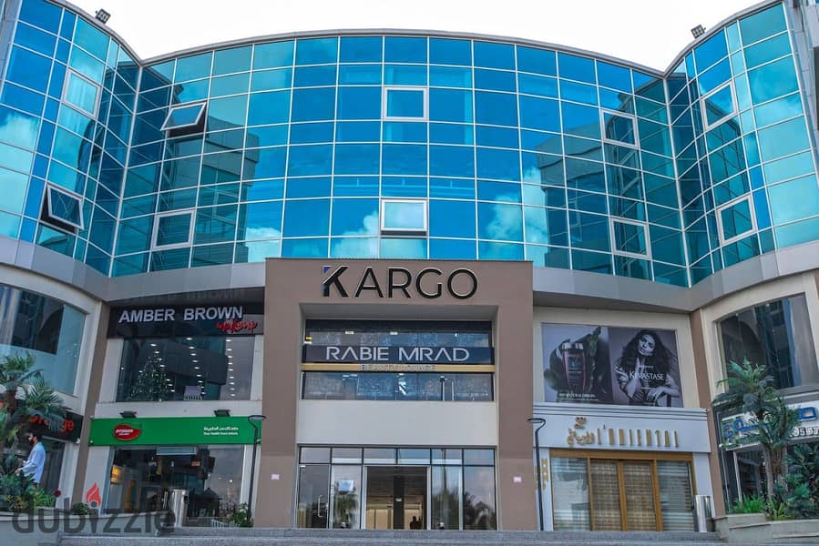 للايجار محل 55  متر متشطب بالكامل في كارجو مول بقلب الشيخ زايد على شارع الشباب مباشرة - Kargo Mall Zayed 7