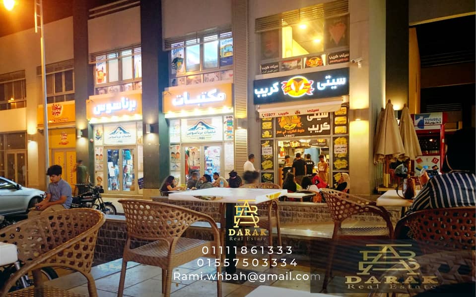 Shop for sale, a bargain in Madinaty, Block 2, at a commercial price, finished, with shops, a distinguished location, shop for sale in Madinaty 2