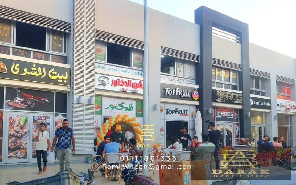 Shop for sale, a bargain in Madinaty, Block 2, at a commercial price, finished, with shops, a distinguished location, shop for sale in Madinaty 9