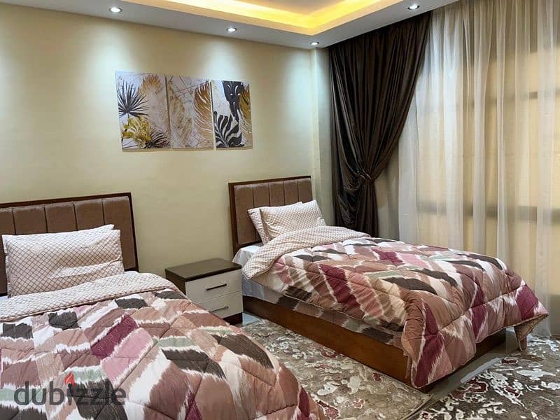 A hotel 2 bedrooms furnished flat for rent in Gb11 madinaty 6