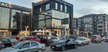 Shop for sale, 31 sqm, ground floor, in the most famous mall in Shorouk, in front of Green Hills Club and Dar Misr Compound, immediate receipt, instal