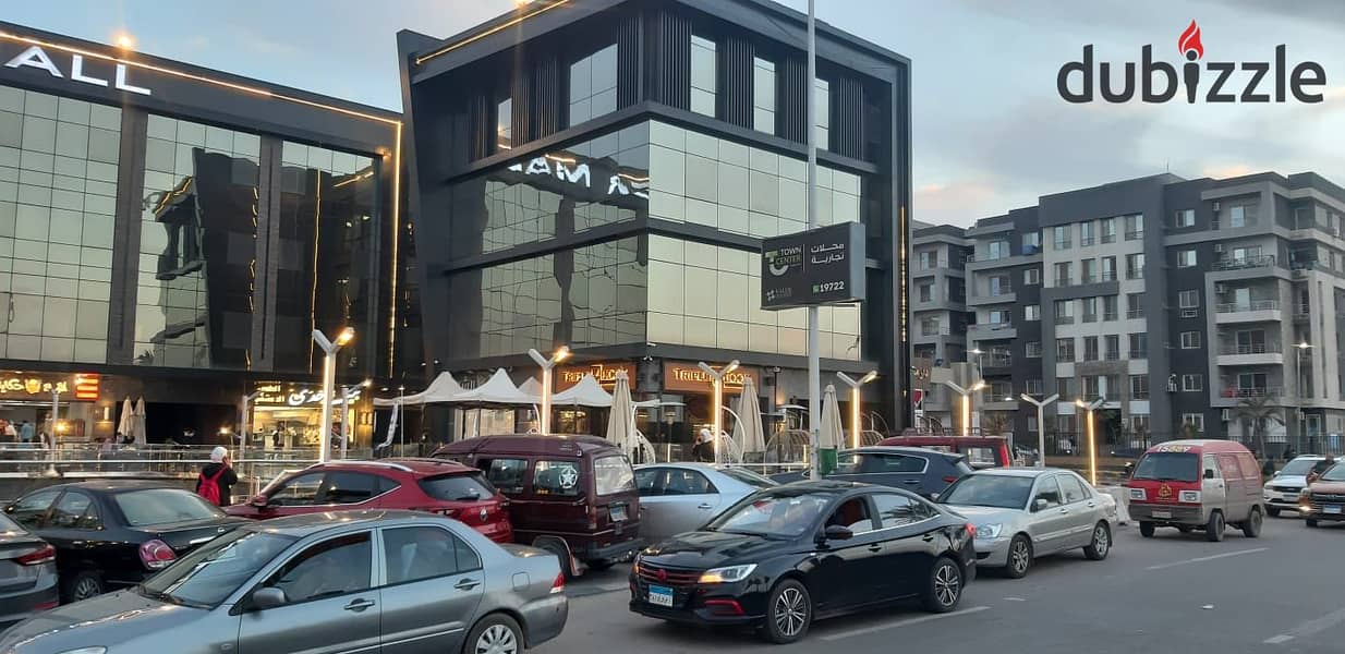 A shop for rent in Shorouk, area of ​​77 square meters, in a distinguished location in the most distinguished and densely populated mall in Shorouk. 12