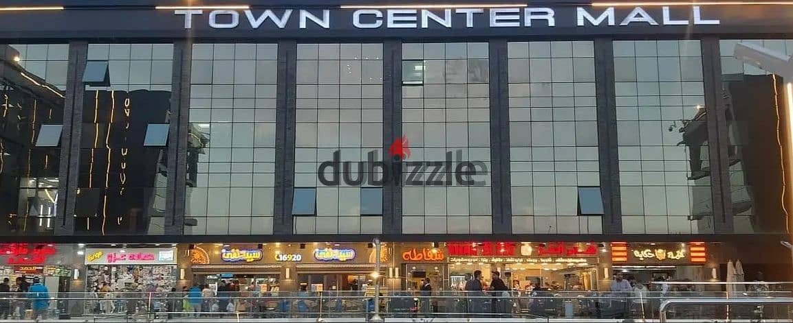 Shop for sale, ground floor, lower level, Town Center Mall, in the middle of the most famous brands with the highest traffic in Shorouk City, in insta 3