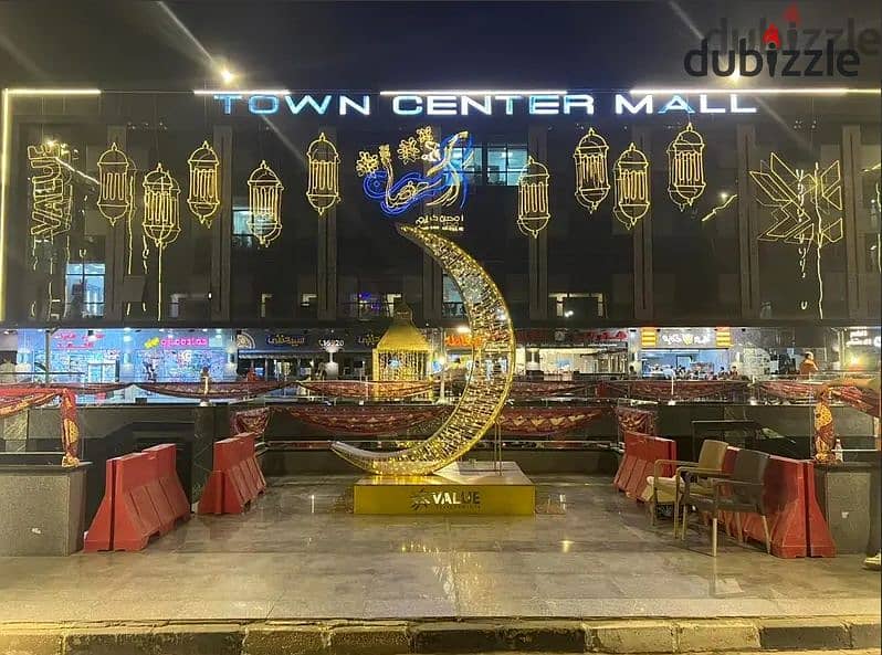 Shop for sale, ground floor, lower level, Town Center Mall, in the middle of the most famous brands with the highest traffic in Shorouk City, in insta 4