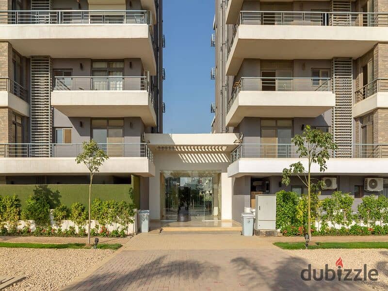 Garden duplex for sale in Taj City Compound, prime location in the most distinguished phases of the compound, with a 40% discount 4