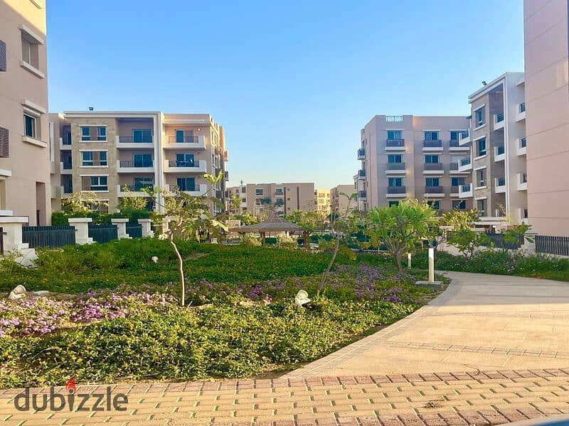 Ground floor duplex with garden for sale in Taj City Compound, First Settlement, in the most distinguished phases of the compound, with installments w 4