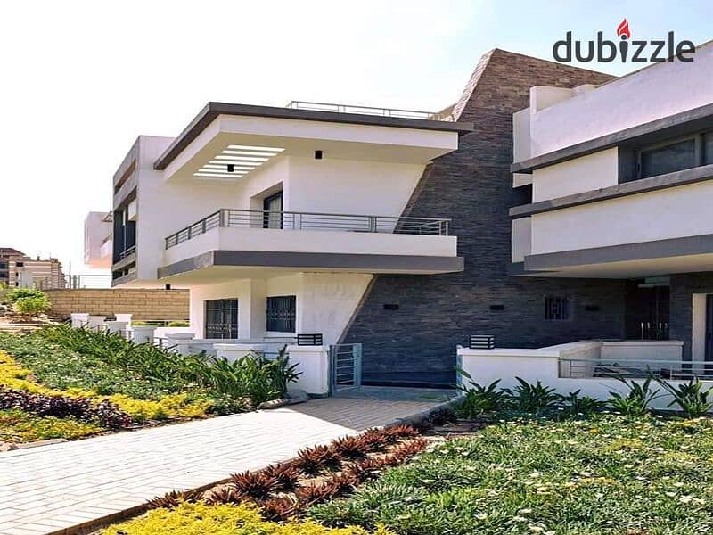 Garden duplex 220m for sale in Taj City Prime Location compound, with installments over 8 years, interest-free 10