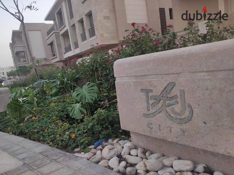 Garden duplex 220m for sale in Taj City Prime Location compound, with installments over 8 years, interest-free 20