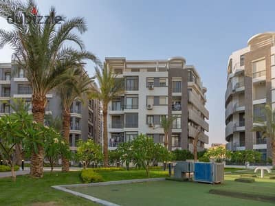 Garden duplex 210m prime location for sale in Taj City Compound in installments over 8 years