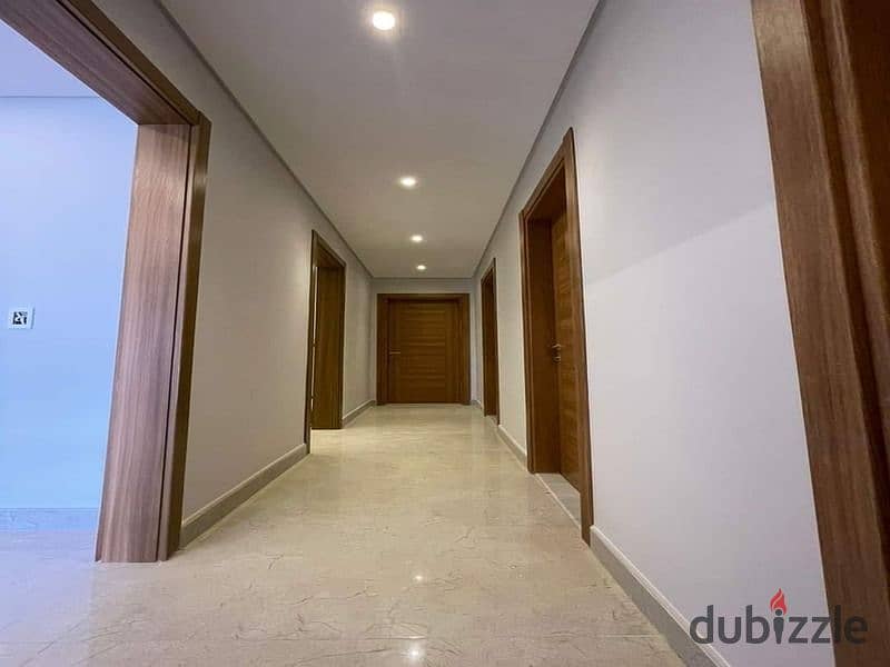 Ground floor duplex with garden for sale in Creek Town Compound, New Cairo 12