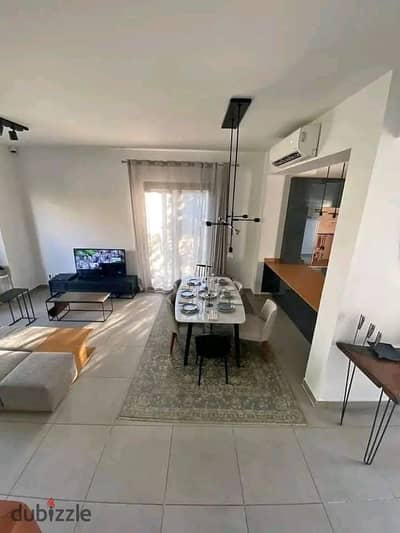 Duplex with garden for sale, immediate receipt and finished, in Al-Shorouk, directly in front of the International Medical Center | Al Burouj Compound