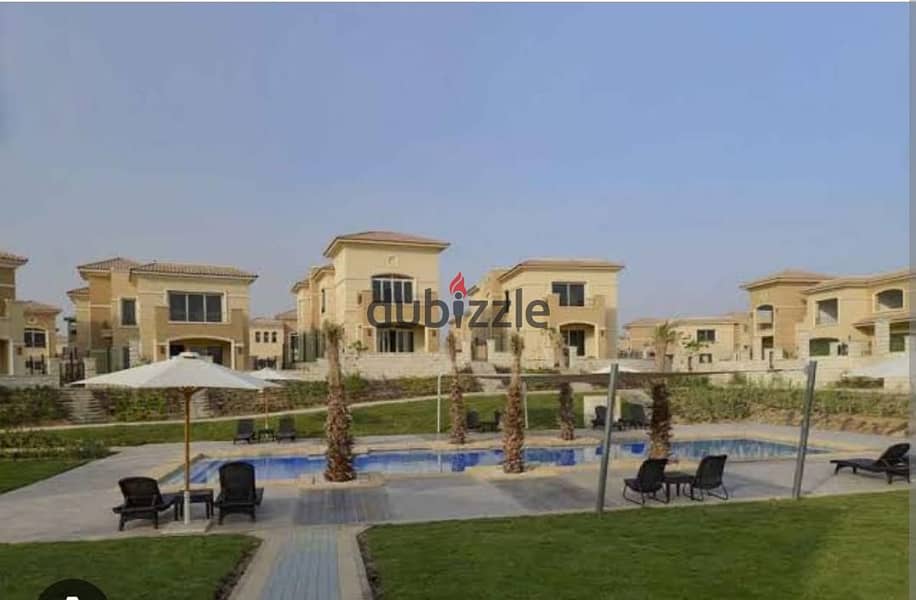 Standalone villa for sale in installments land, 540 m landscape view and lagoon in Stone Park 2