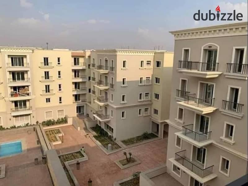 Apartment for sale, fully finished, with air conditioners and immediate receipt, in the most prestigious compound in Sheikh Zayed | Village West Villa 1