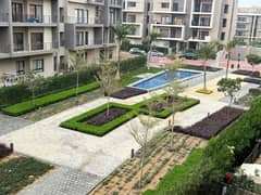 Ground apartment with garden for sale in New Cairo, finished in installments, 136 m 0