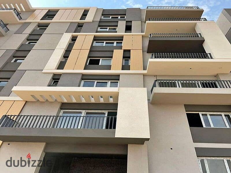 Distinctive subdivided penthouse for sale in Hap Town Hassan Allam Compound for sale, wall by wall, with Madinaty 1