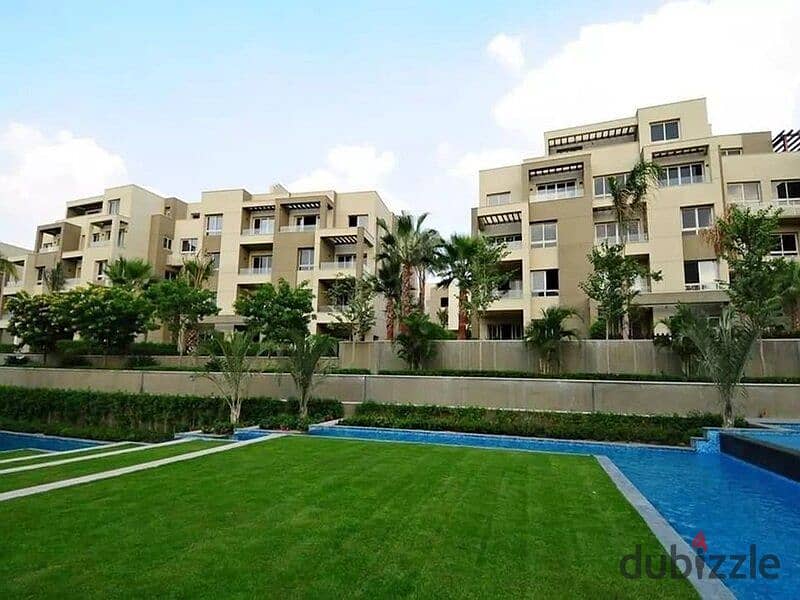 Distinctive subdivided penthouse for sale in Hap Town Hassan Allam Compound for sale, wall by wall, with Madinaty 2