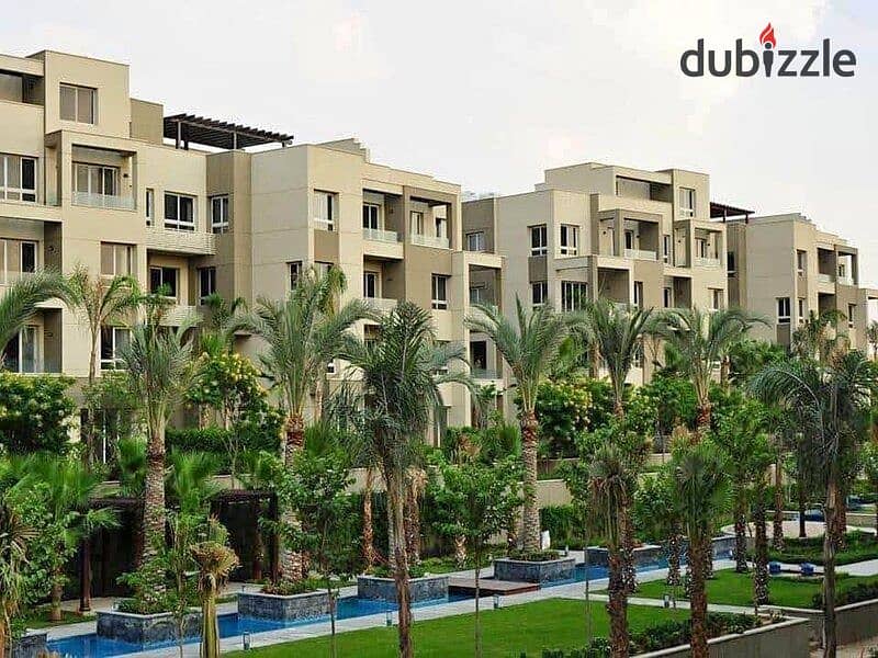 Distinctive subdivided penthouse for sale in Hap Town Hassan Allam Compound for sale, wall by wall, with Madinaty 4